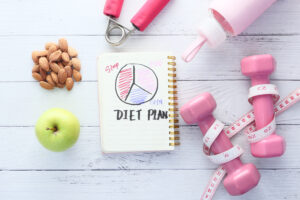 vecteezy diet plan with apple and dumbbell on white wooden background 2028676