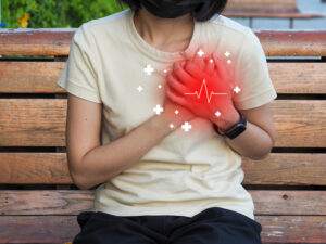 vecteezy young woman showing chest pain heart red icon with white 20177404